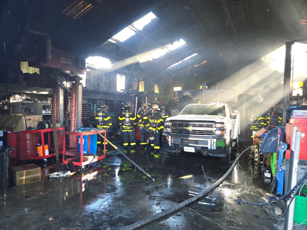 Commercial Structure Fire: dept members operating 
2025. (Photo not mine)